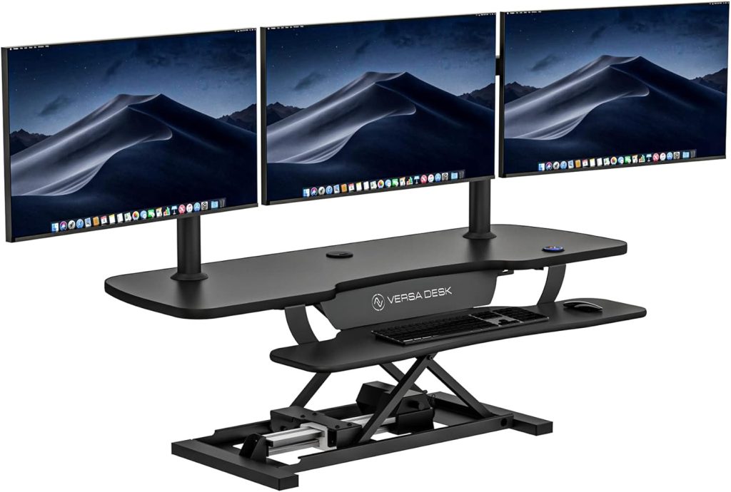 VERSADESK Electric Standing Desk Converter, 48 Inch PowerPro Height-Adjustable Sit Stand Desktop Riser, Keyboard Tray, USB Charging Port, 48″ W X 24″ D, Black VERSADESK Electric Standing Desk Converter, 48 Inch PowerPro Height-Adjustable Sit Stand Desktop Riser, Keyboard Tray, USB Charging Port, 48″ W X 24″ D, Black